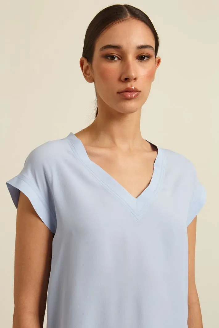 Blusa in crêpe de chine