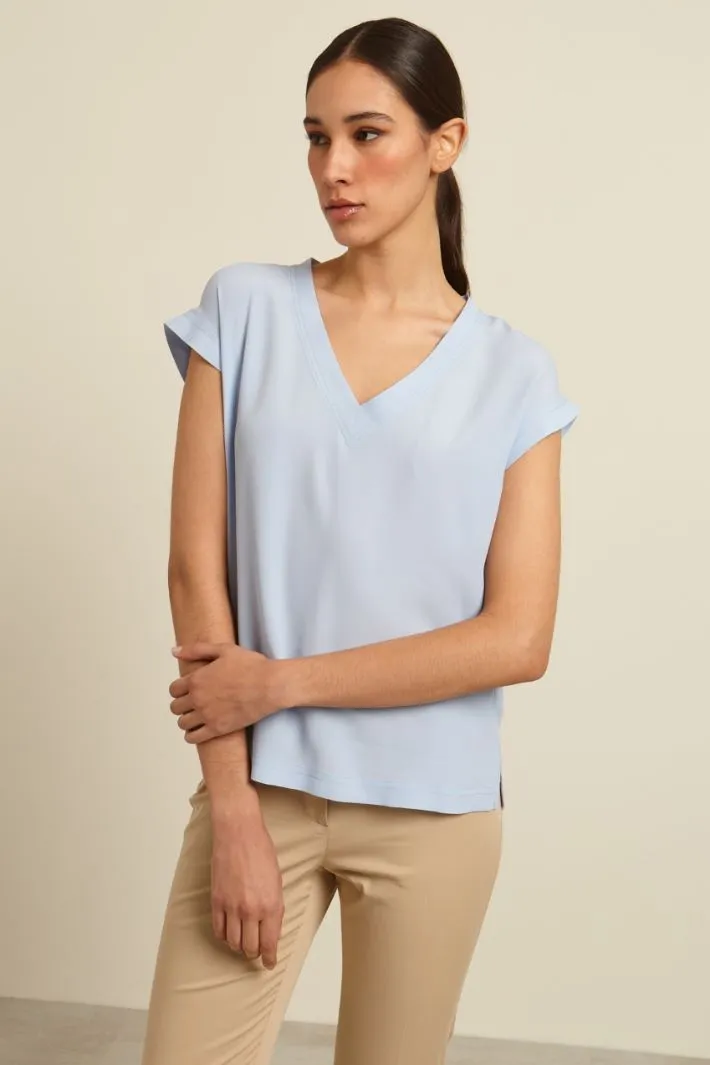 Blusa in crêpe de chine