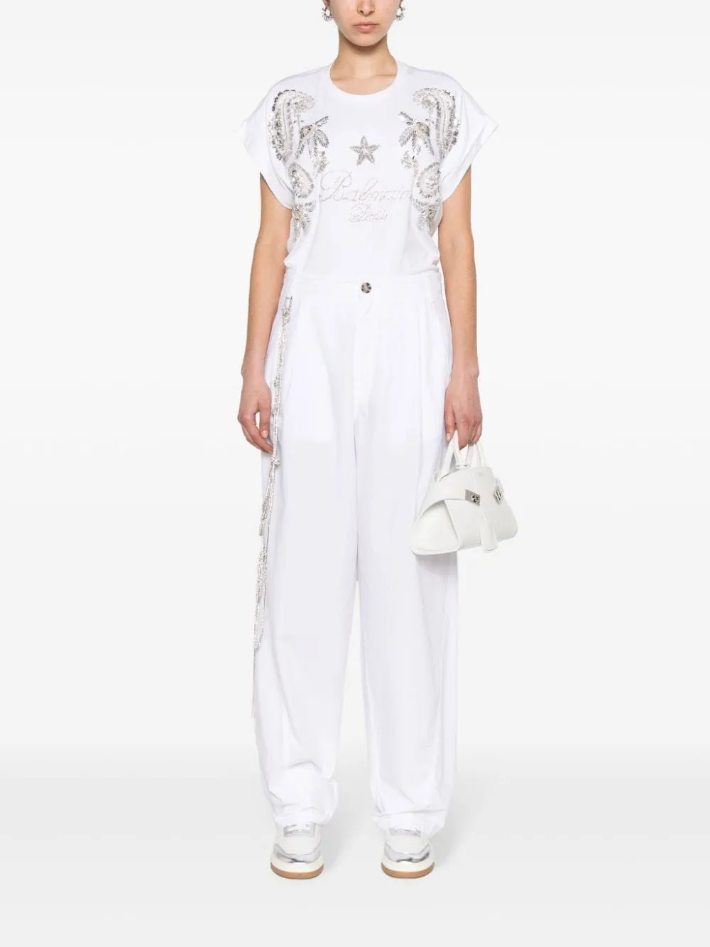 Pantaloni a gamba larga con catena di cristalli in bianco - donna