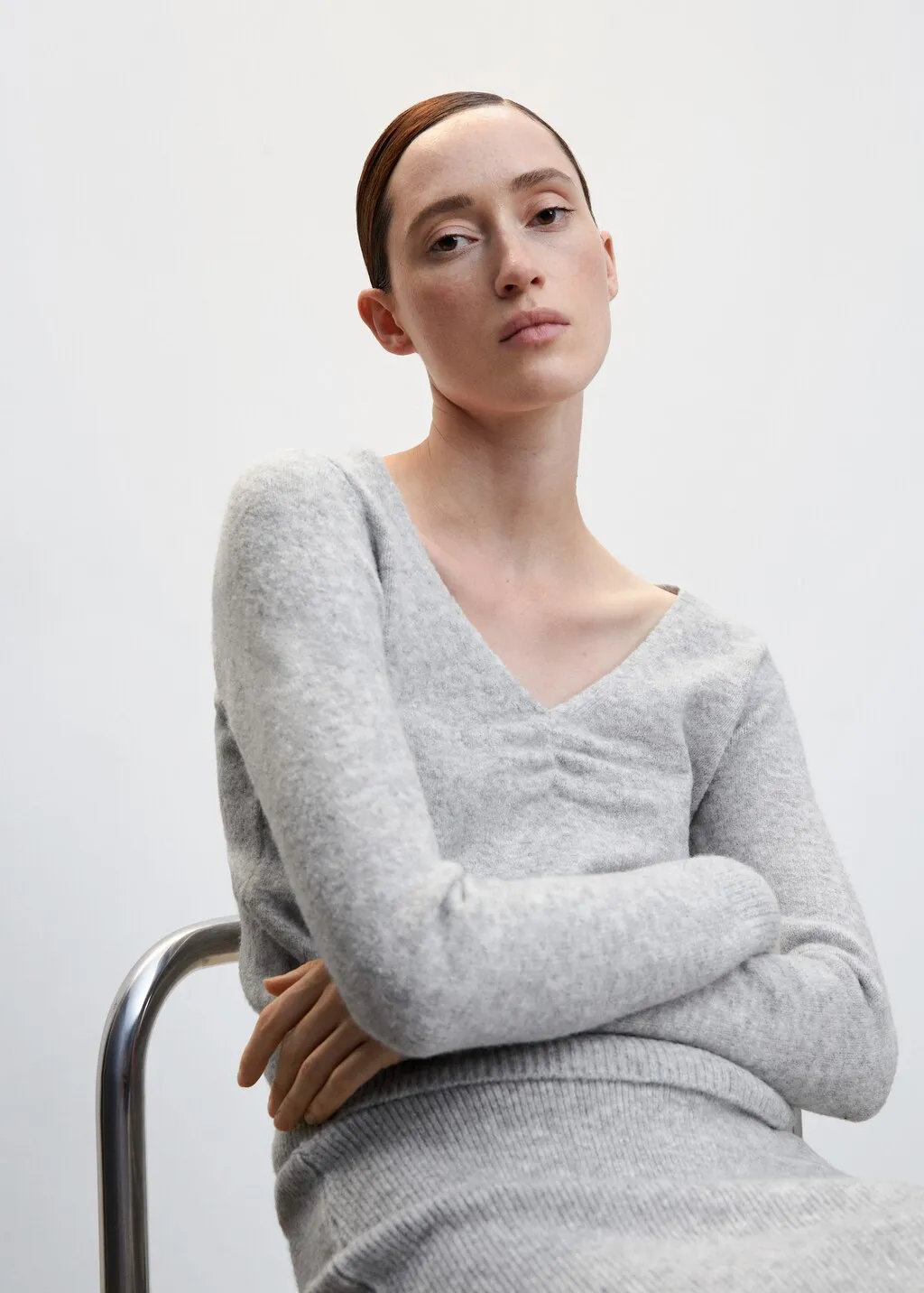 Pullover collo a V increspato