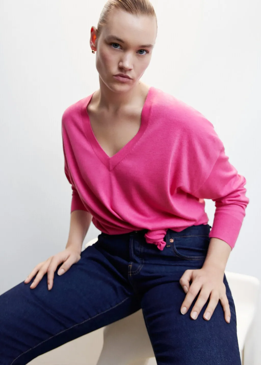 Pullover collo a V spacchi