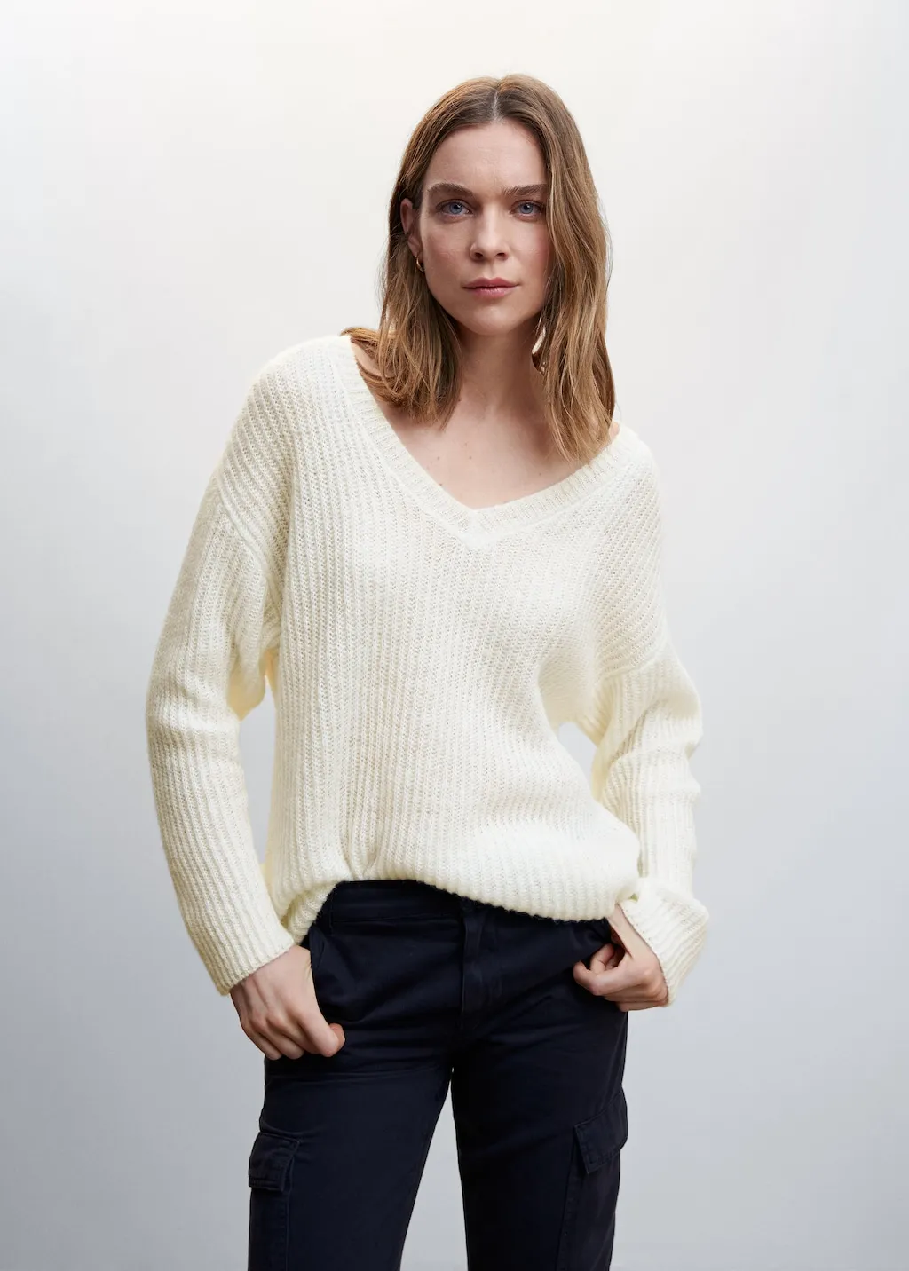 Pullover coste collo a V
