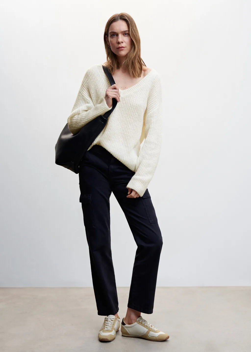 Pullover coste collo a V