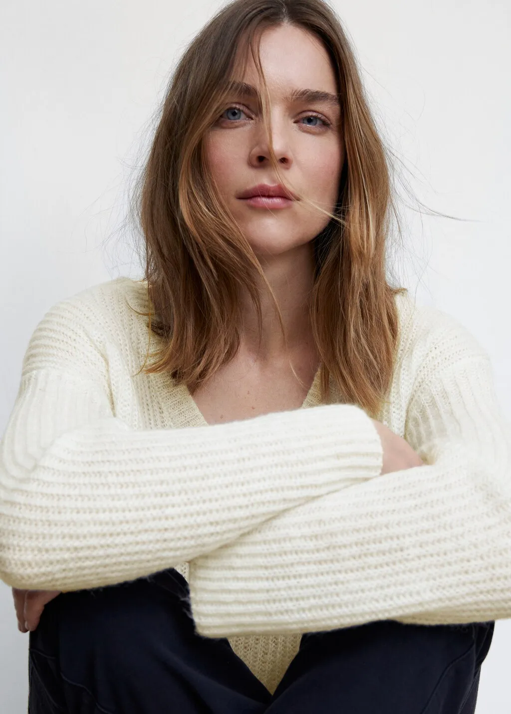 Pullover coste collo a V