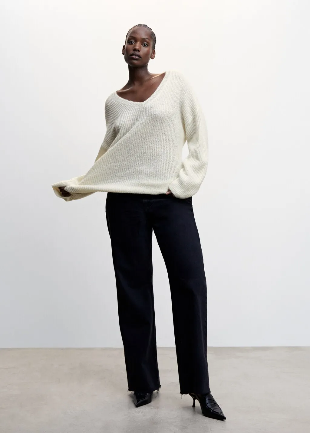 Pullover coste collo a V