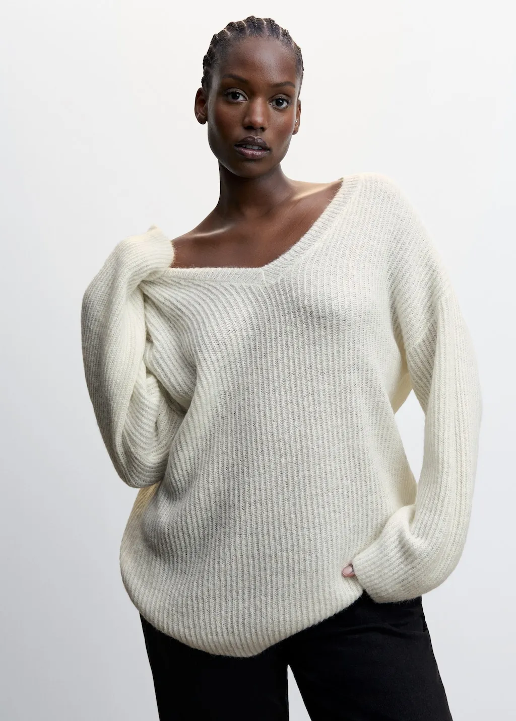 Pullover coste collo a V