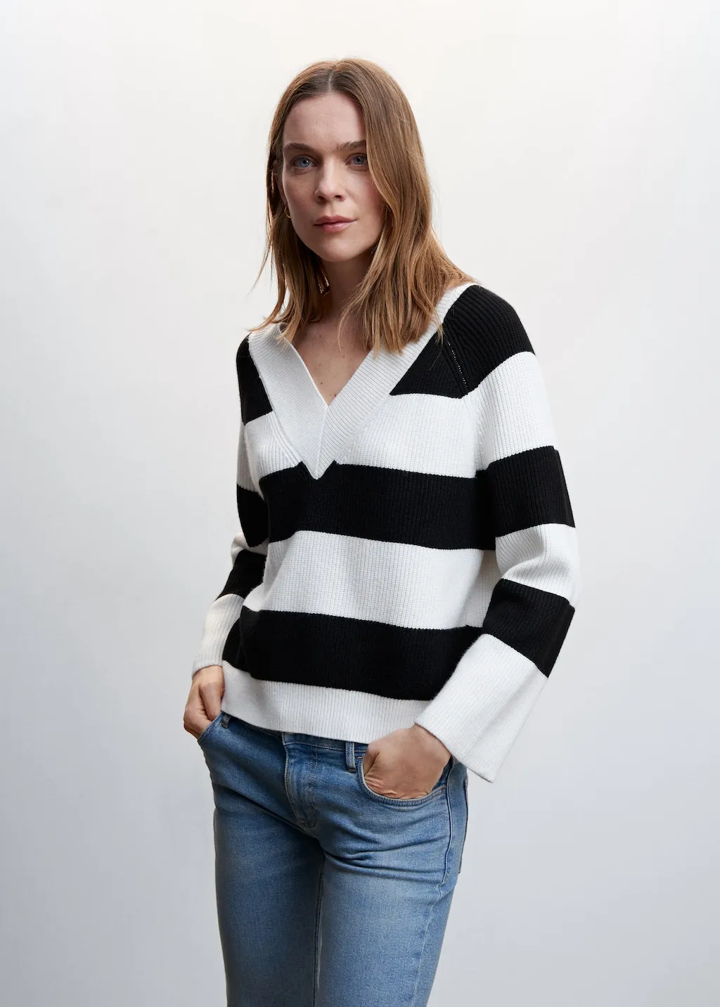 Pullover righe collo a V