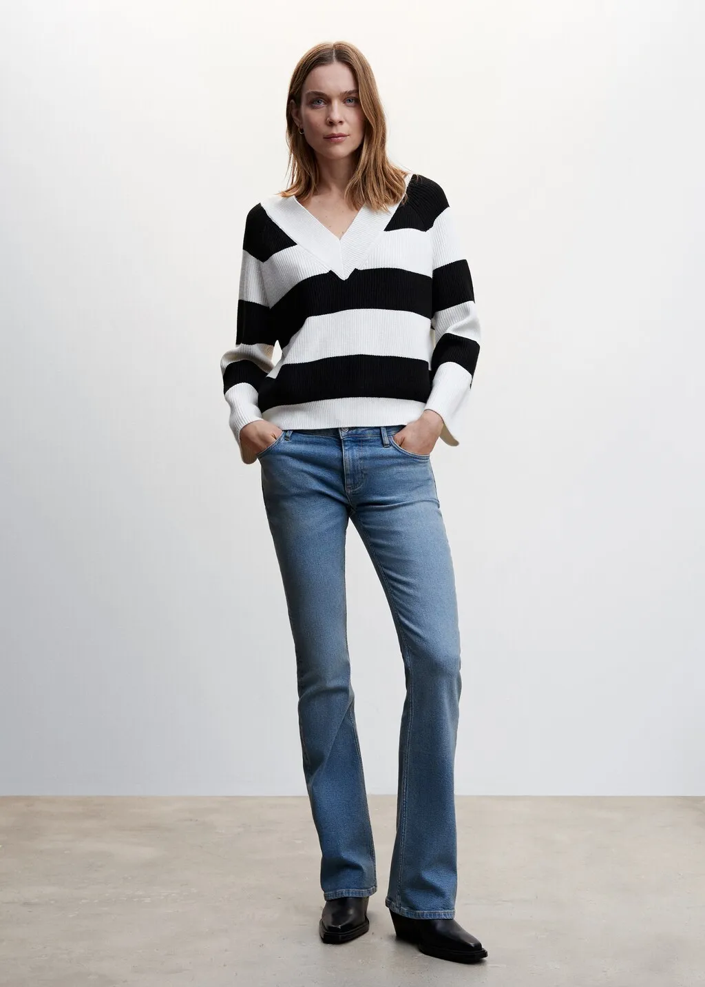 Pullover righe collo a V