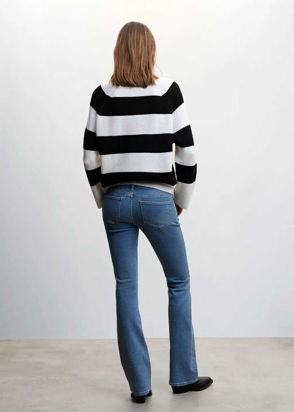 Pullover righe collo a V