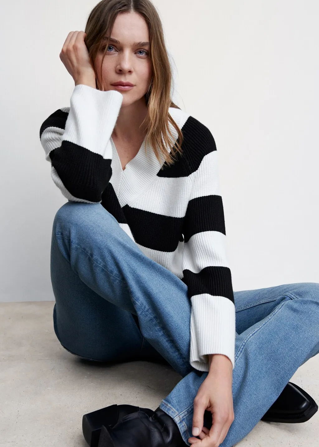 Pullover righe collo a V
