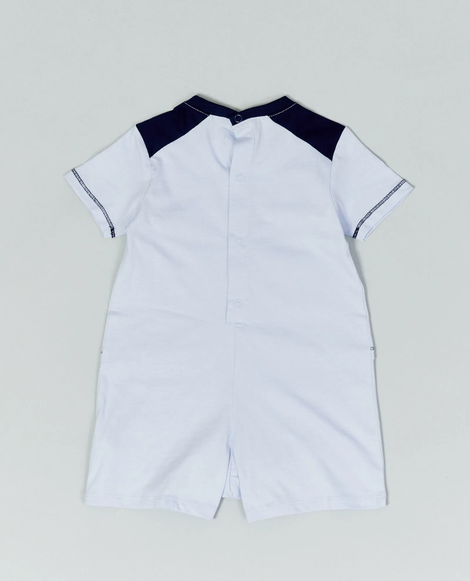 Tutina bambino con chiusura sul retro e logo